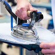 Formation aux bonnes pratiques de repassage en blanchisserie